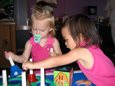 Trying out the different bells in the Discovery room